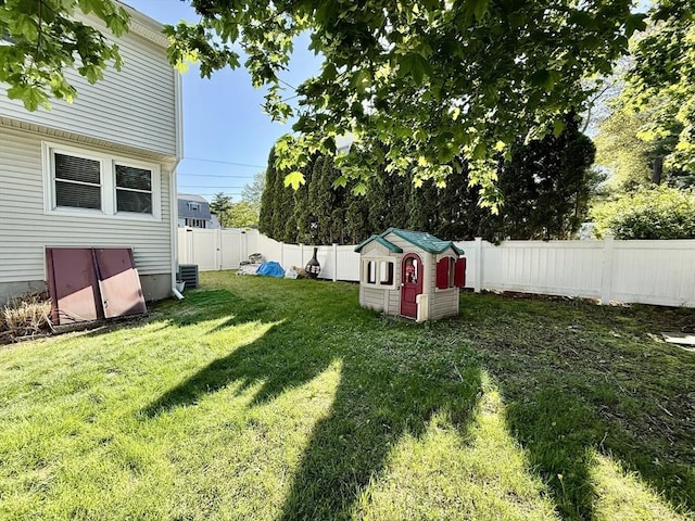view of yard featuring central AC unit