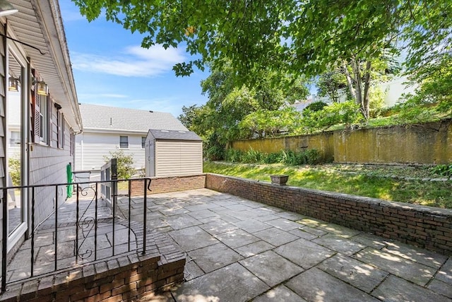 97 Marshall St, Revere, MA 02151 - fenced backyard with a shed and a patio