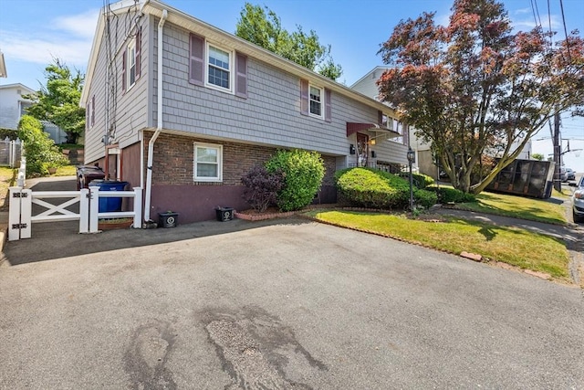 97 Marshall St, Revere, MA 02151 - view of front of property featuring driveway and a gate