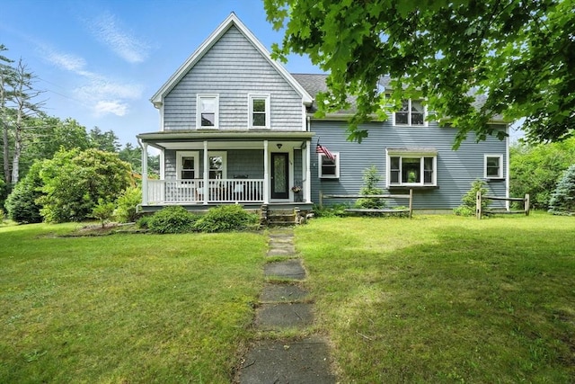 114 Center St, Carver, MA 02330 - back of house with a lawn and covered porch