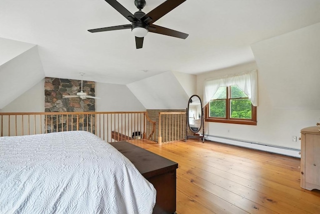 114 Center St, Carver, MA 02330 - bedroom with a baseboard radiator, wood-type flooring, lofted ceiling, and a ceiling fan