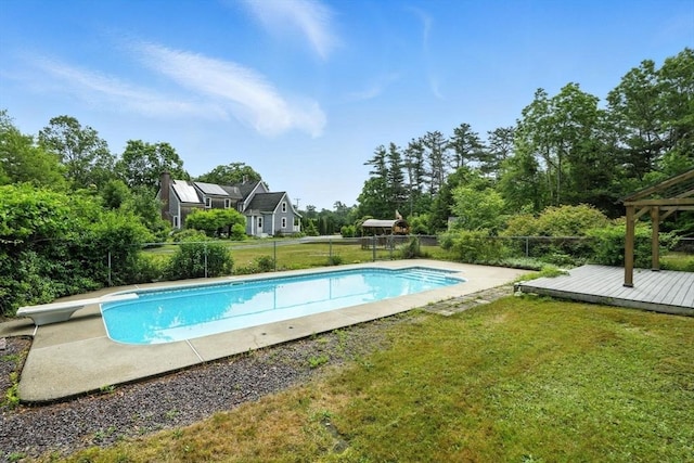 114 Center St, Carver, MA 02330 - view of swimming pool with a fenced backyard, a diving board, and view of scattered trees