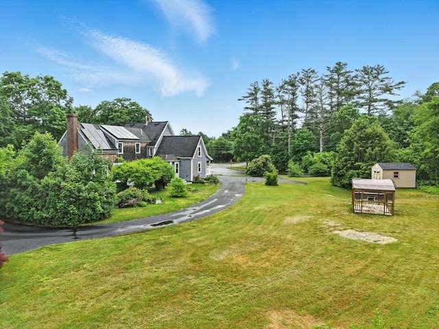 114 Center St, Carver, MA 02330 - view of green lawn with an outdoor structure