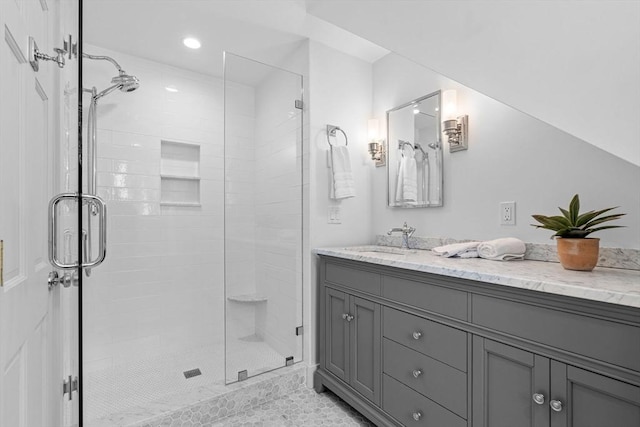 bathroom featuring vanity, a shower stall, recessed lighting, and tile patterned floors