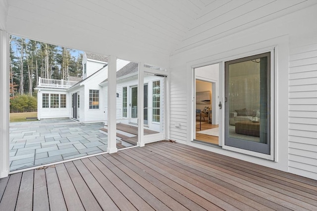 wooden deck featuring a patio