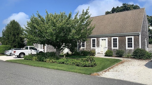 121 Camp St Unit 108, Yarmouth, MA 02673 - view of front of property with roof with shingles and a front yard