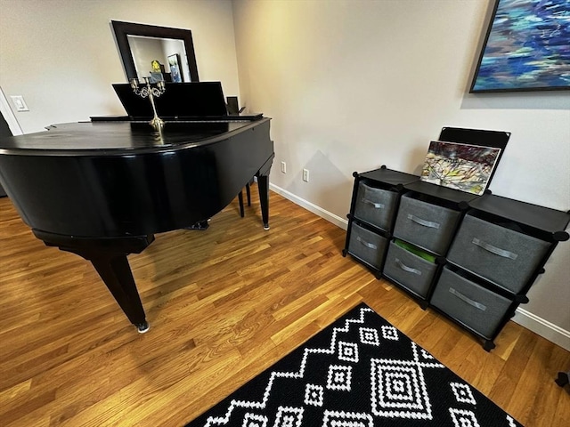 121 Camp St Unit 108, Yarmouth, MA 02673 - living area with baseboards and wood finished floors