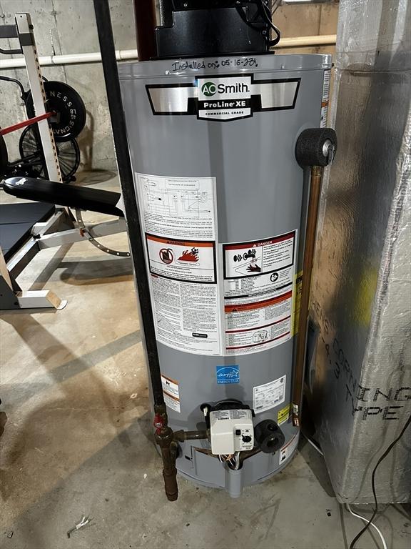 121 Camp St Unit 108, Yarmouth, MA 02673 - utility room featuring water heater