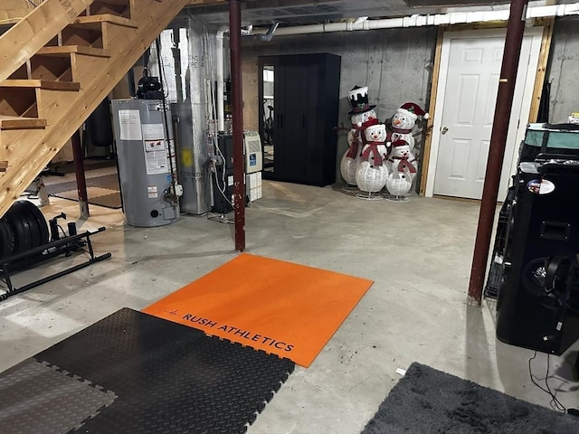 121 Camp St Unit 108, Yarmouth, MA 02673 - unfinished basement featuring water heater and stairs