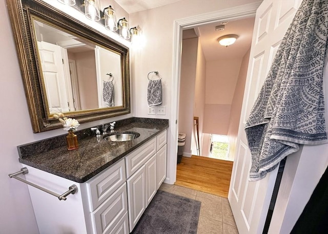 121 Camp St Unit 108, Yarmouth, MA 02673 - bathroom featuring tile patterned floors, vanity, and toilet