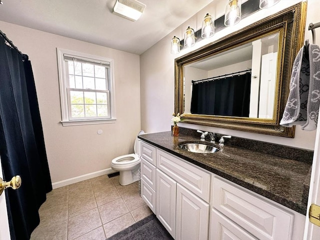 121 Camp St Unit 108, Yarmouth, MA 02673 - full bathroom with vanity, toilet, baseboards, tile patterned floors, and curtained shower