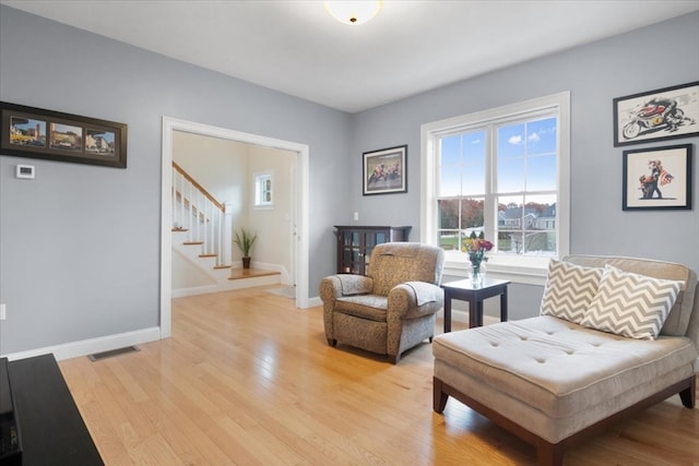 sitting room featuring light wood-type flooring