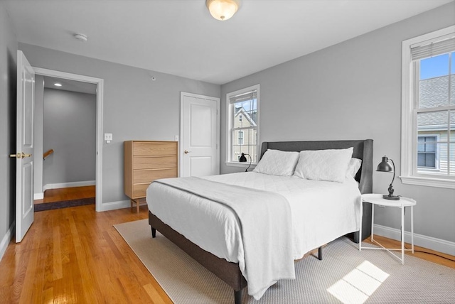 bedroom with wood-type flooring