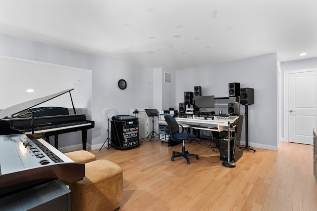 home office featuring light hardwood / wood-style floors