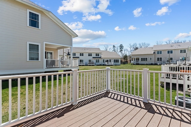 wooden terrace with a yard