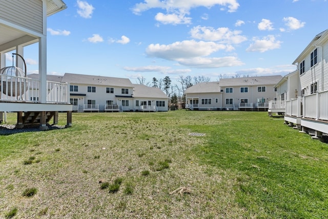 view of yard featuring a wooden deck