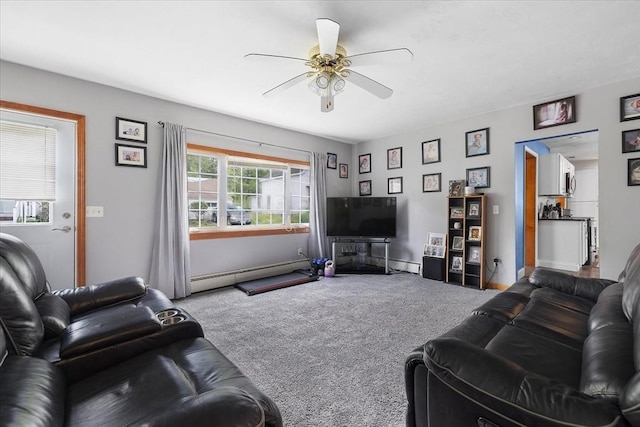 9 Green St, Brookfield, MA 01506 - living room with a baseboard radiator, carpet flooring, ceiling fan, and baseboards