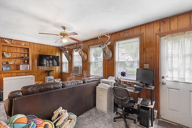 9 Green St, Brookfield, MA 01506 - office with wood walls, light colored carpet, and a ceiling fan