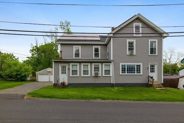 9 Green St, Brookfield, MA 01506 - traditional-style house featuring entry steps, an outdoor structure, a front yard, a detached garage, and solar panels