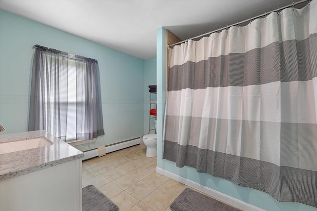 9 Green St, Brookfield, MA 01506 - full bath with toilet, tile patterned flooring, vanity, baseboard heating, and baseboards