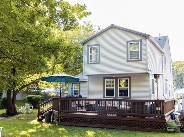 1 Gwinnett St, Boston, MA 02136 - back of property featuring a deck and a lawn