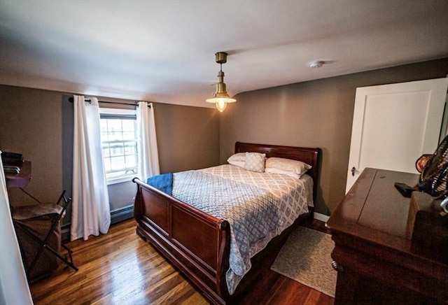 1 Gwinnett St, Boston, MA 02136 - bedroom featuring wood finished floors and a baseboard heating unit