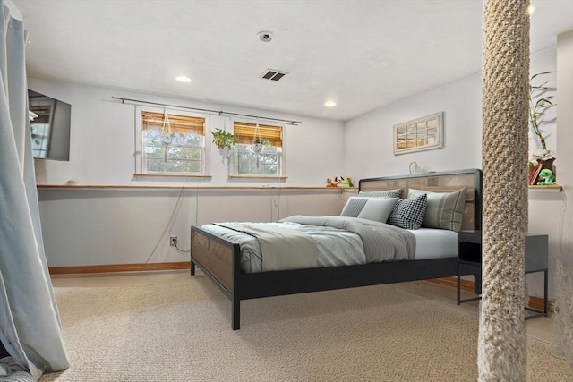 carpeted bedroom featuring recessed lighting