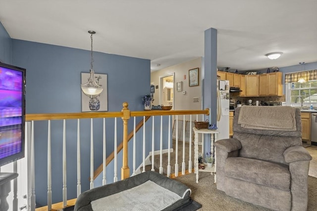 sitting room featuring carpet