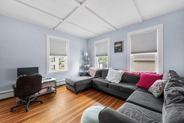 60 Lynnfield St, Lynn, MA 01904 - living room featuring a baseboard heating unit and wood finished floors