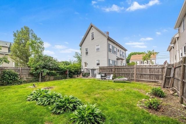60 Lynnfield St, Lynn, MA 01904 - rear view of house featuring a chimney