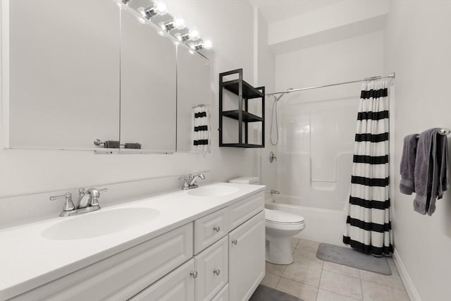 full bath featuring double vanity, a sink, toilet, and shower / tub combo