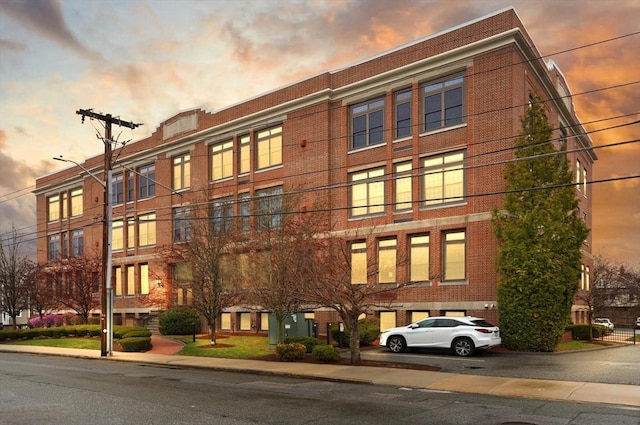 view of property at dusk