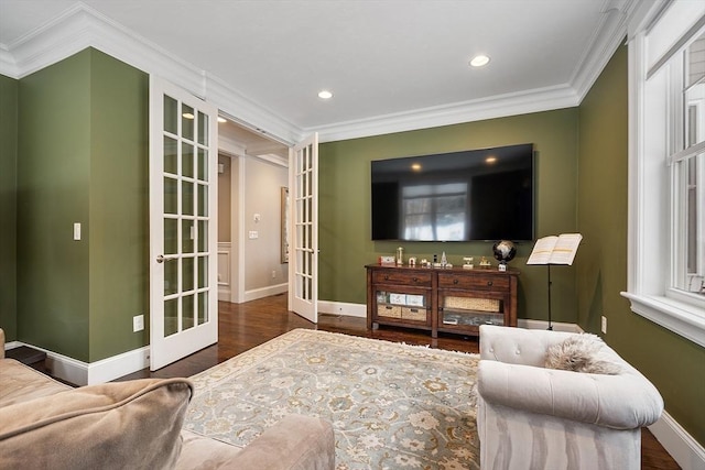 living room featuring recessed lighting, baseboards, ornamental molding, french doors, and dark wood finished floors