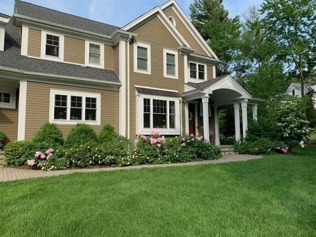 craftsman house with a front yard