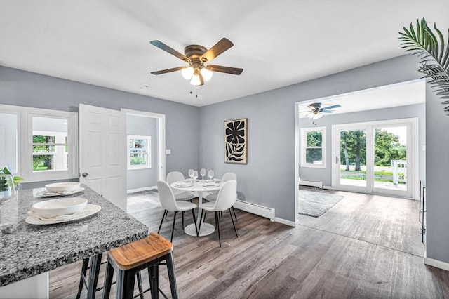 759 Millers Falls Rd, Northfield, MA 01360 - dining space featuring baseboard heating, a ceiling fan, and wood finished floors
