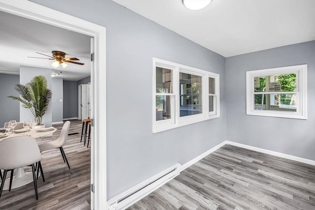 759 Millers Falls Rd, Northfield, MA 01360 - empty room with baseboard heating, wood finished floors, and ceiling fan