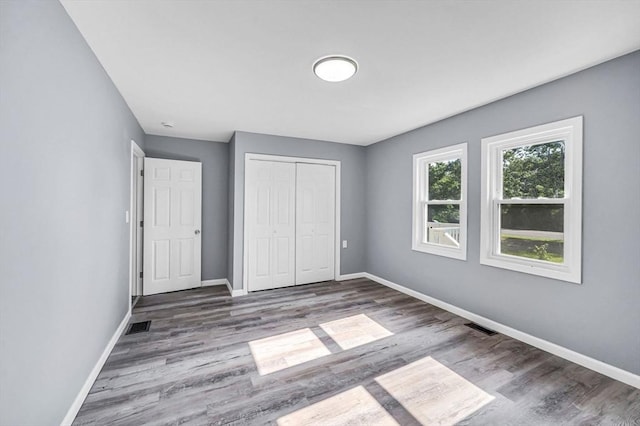 759 Millers Falls Rd, Northfield, MA 01360 - unfurnished bedroom featuring wood finished floors and a closet