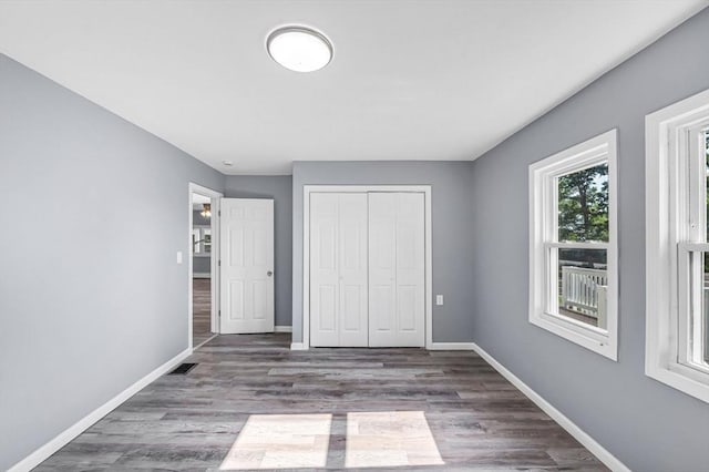 759 Millers Falls Rd, Northfield, MA 01360 - unfurnished bedroom featuring a closet and wood finished floors
