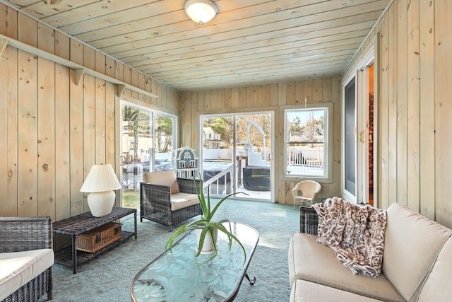 sunroom featuring wooden ceiling