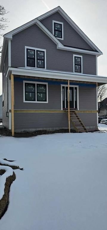 view of front of property featuring covered porch