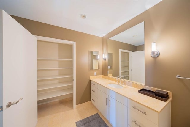 bathroom featuring vanity and baseboards