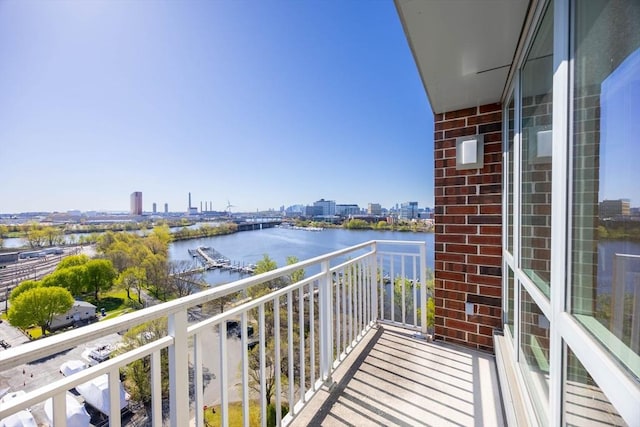 balcony with a city view and a water view