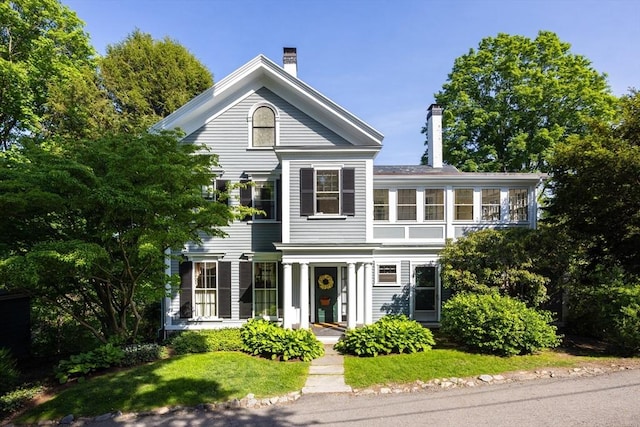 33 Wellington Ln, Belmont, MA 02478 - greek revival house with a chimney