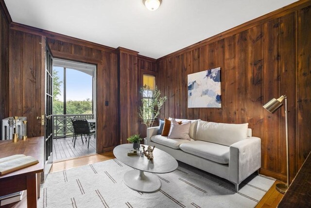 33 Wellington Ln, Belmont, MA 02478 - living area with wooden walls and light wood finished floors