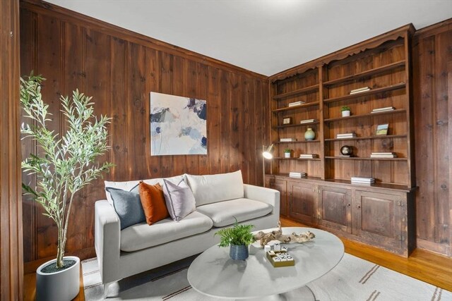 33 Wellington Ln, Belmont, MA 02478 - living area featuring wooden walls, wood finished floors, and built in features