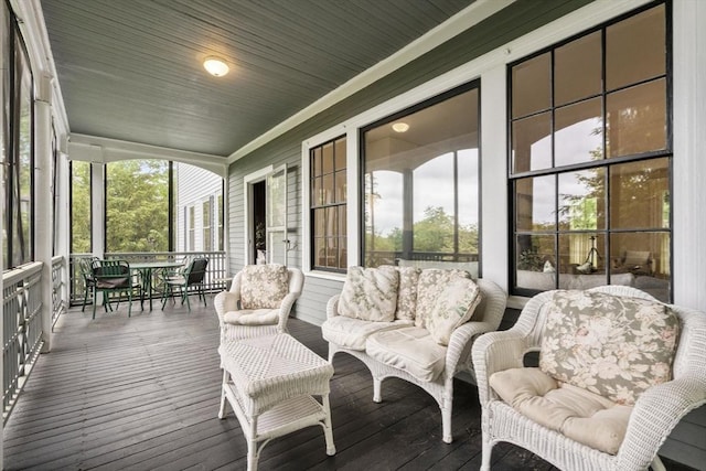 33 Wellington Ln, Belmont, MA 02478 - sunroom / solarium featuring hardwood / wood-style flooring, ornamental molding, and an outdoor hangout area