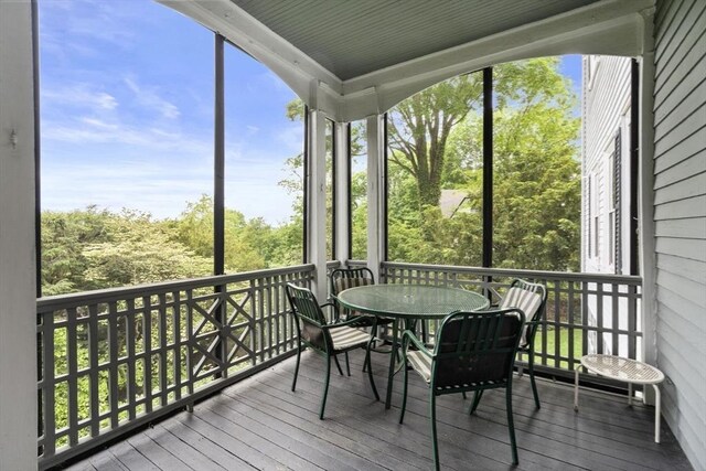 33 Wellington Ln, Belmont, MA 02478 - sunroom featuring outdoor dining space