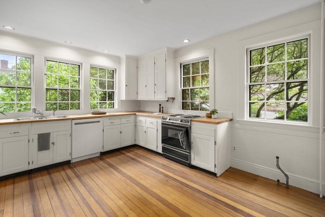 33 Wellington Ln, Belmont, MA 02478 - kitchen with dishwasher, stainless steel range, hardwood / wood-style flooring, a sink, and white cabinetry