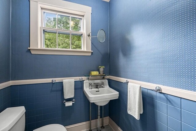 33 Wellington Ln, Belmont, MA 02478 - bathroom featuring toilet, wallpapered walls, and a wainscoted wall