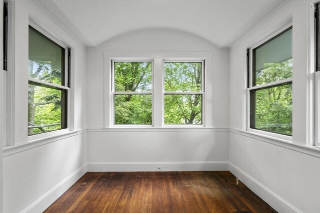 33 Wellington Ln, Belmont, MA 02478 - unfurnished room with baseboards, dark wood-style floors, and vaulted ceiling